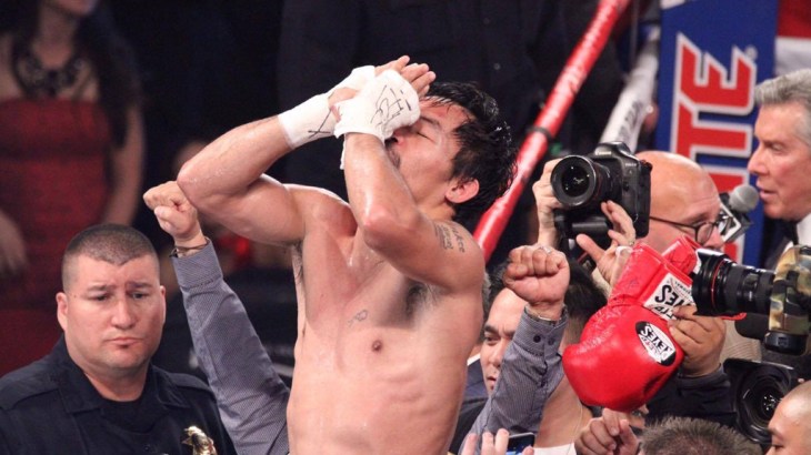 Pacquiao wins to scores of 118-109, 118-109, 114-113 (Photo by Jhay Oh Otamias)